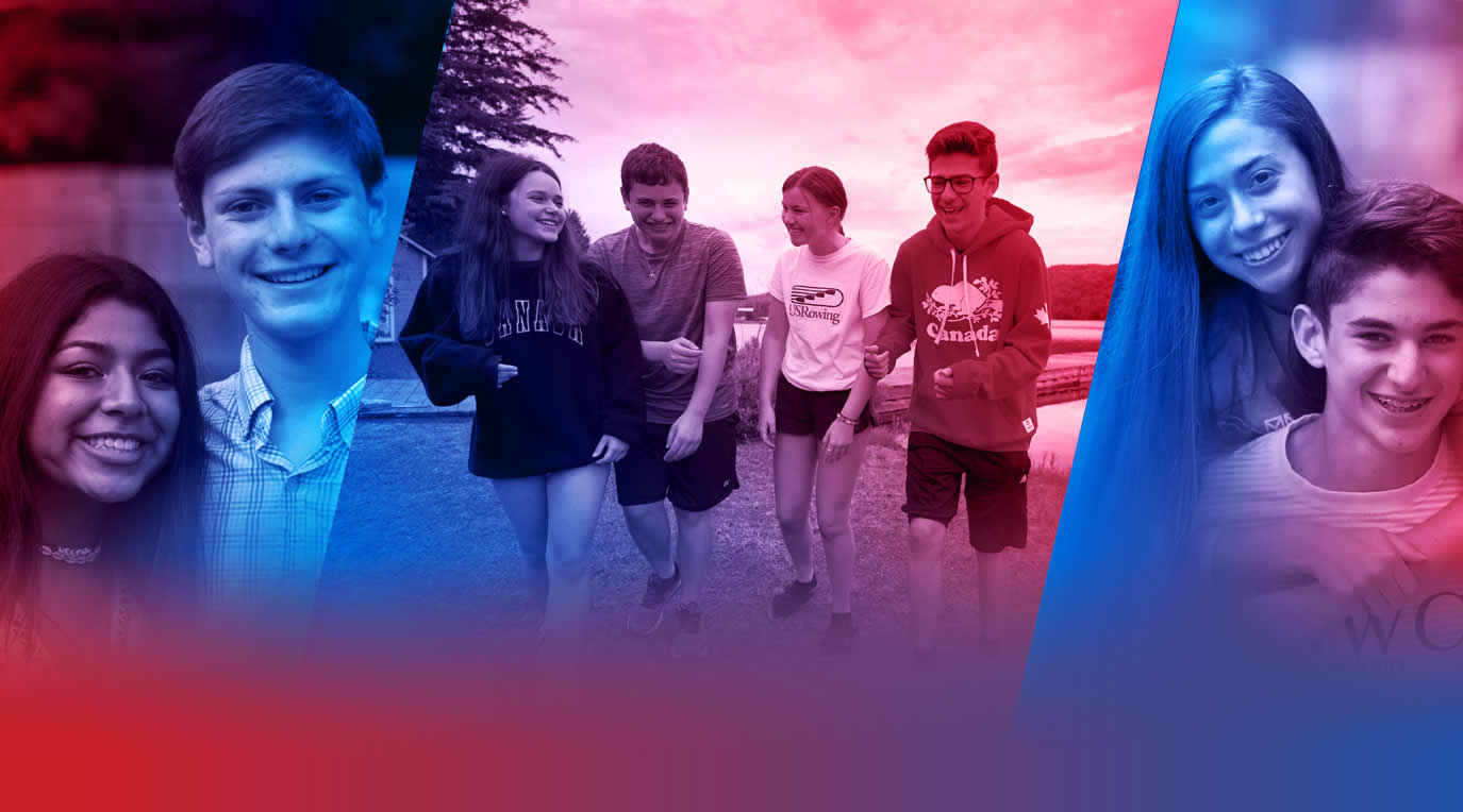 Un grupo de jóvenes de diferentes orígenes sonriendo en un evento comunitario